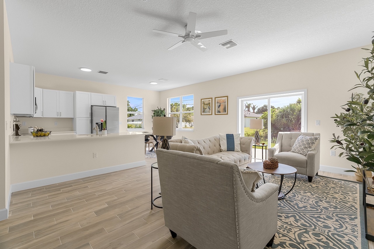 Representative bright open living area in the rent-to-own model