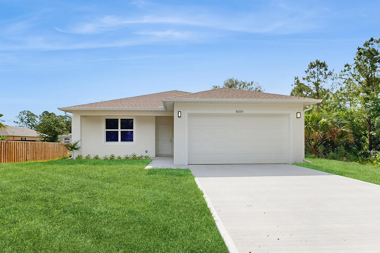 Custom home exterior by Osuna Homes