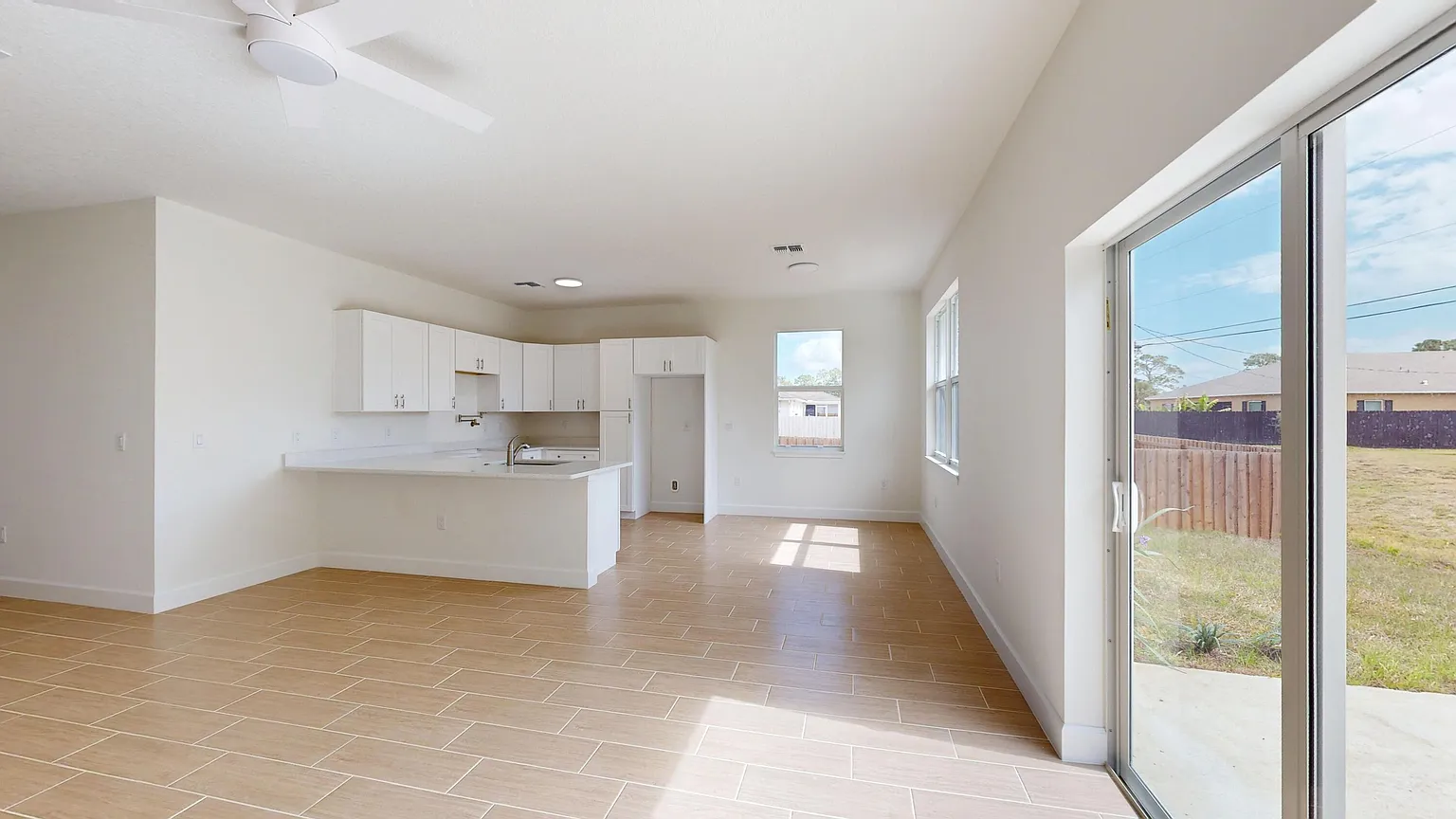 Open living area by Osuna Homes